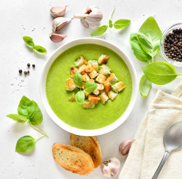 istock Spinach soup with croutons in white bowl 2195076889