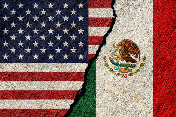 istock usa and mexico flags painted on concrete wall 2195077037