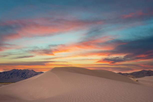 Colorful sunset over a sand dune in Nevada