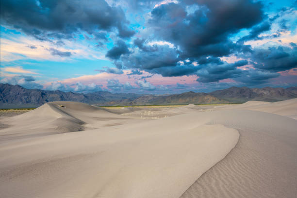 istock Cloudy sunset at Amargosa big dune in Nevada 2195080009