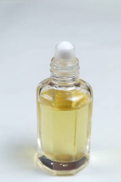 istock jasmine oil in white isolated glass bottle 2195080666