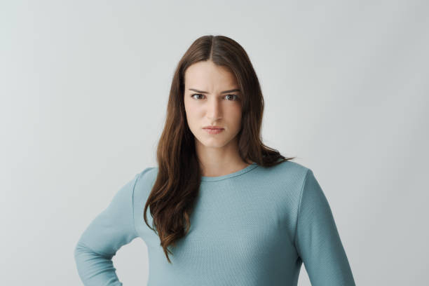 istock Upset disgusted woman staring at camera 2195083223