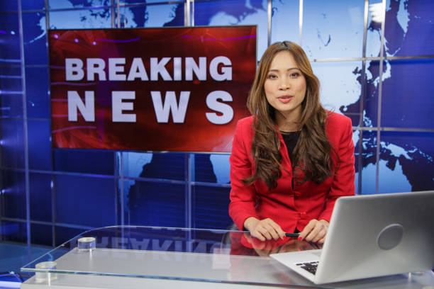 istock Female news anchor 2195085677