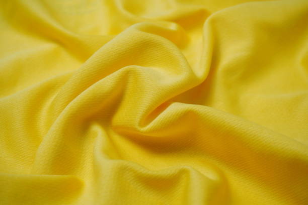 Elegant gold satin drape texture background.