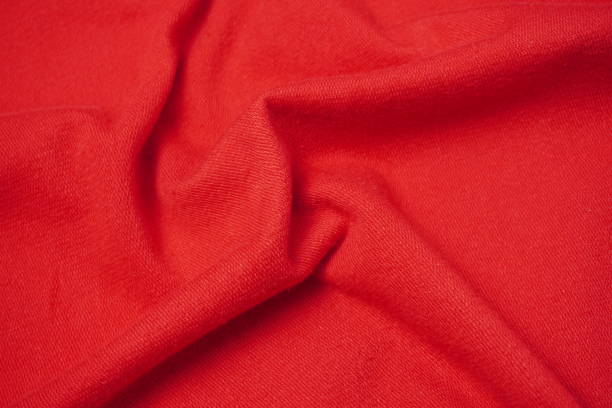 istock red fabric of sweater with ripples and waves texture background 2195091062