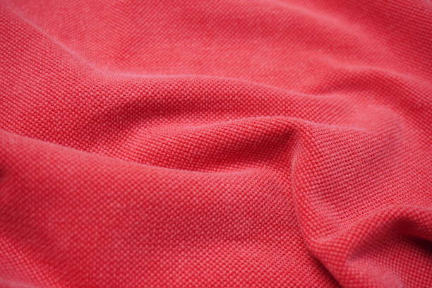 istock texture background of red cotton fabric with ripples and waves 2195091131