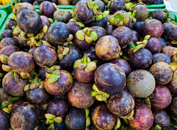 istock Fresh mangosteen fruit at the supermarket. 2195091967