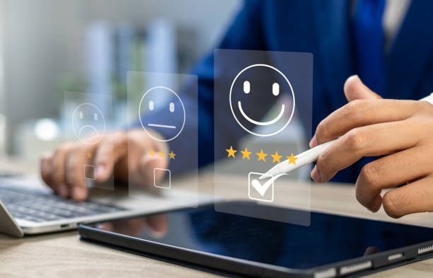 istock Online customer satisfaction survey, Client giving Five-Star feedback and reviews for quality service on application. Experience, Evaluating service quality, Business reputation and ranking concept. 2195092304