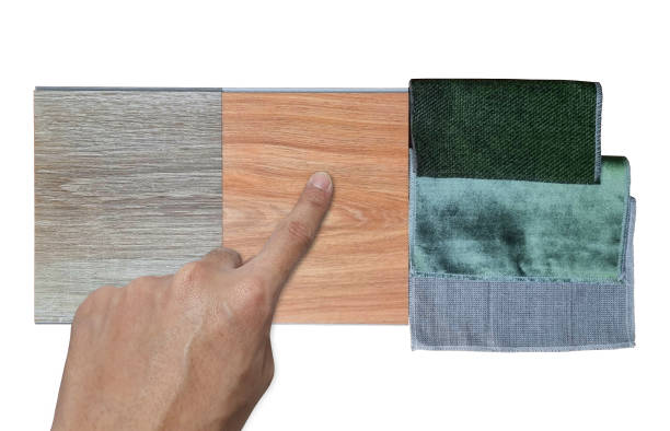 istock architect chooses material samples contains oak and ash vinyl flooring tiles, green and grey drapery, green velvet curtain fabric isolated on background with clipping path. 2195096989