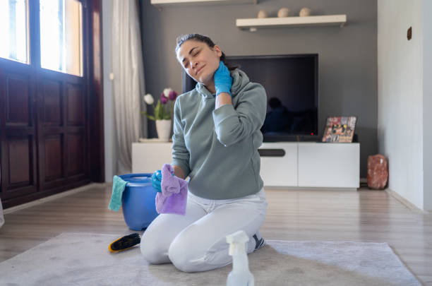 istock Housewife Having Pain While Cleaning Home 2195097655