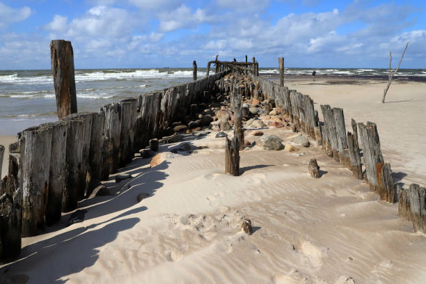 istock Old ruined sea pier. 2195098747