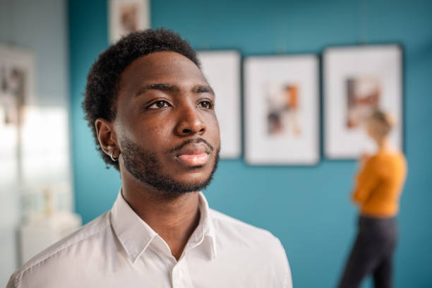 istock Visitor appreciating modern art in a vibrant gallery setting during an exhibition 2195099567