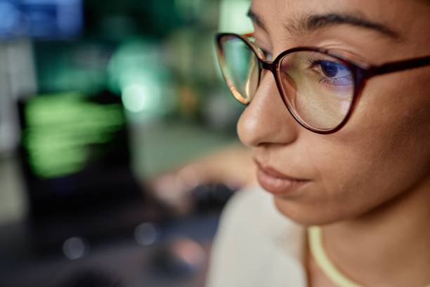 istock Close up of Middle Eastern Female Programmer Wearing Glasses while Working in Office 2195099745