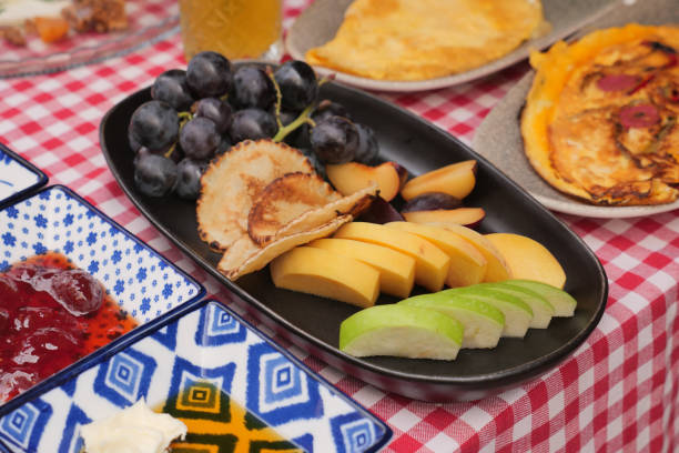 istock A Colorful and Inviting Fruit Platter Beautifully Displayed on a Picnic Table for All 2195099835