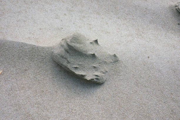 Beautiful sand blocks naturally formed on the beach by the wind