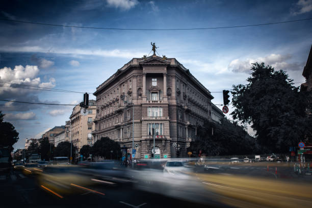 Budapest, Hungary - September 22, 2023 : Long exposure with cars in motion in front of the building.