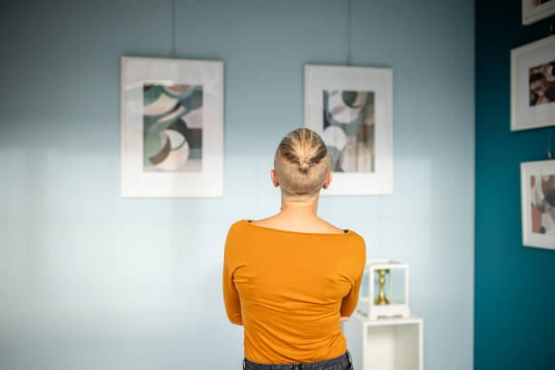istock Exploring modern art at a gallery exhibition on a sunny day 2195103257