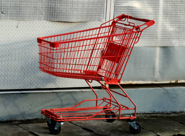 istock red shopping cart. 2195106676