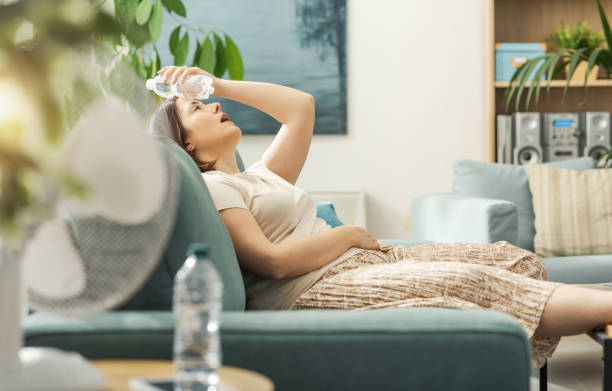 istock Young woman suffering from the heat 2195107399