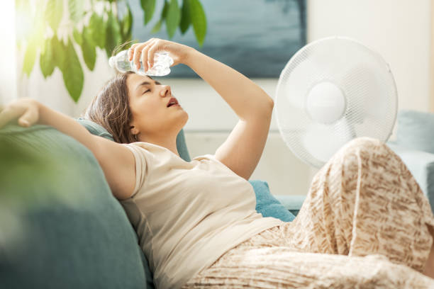 istock Young woman suffering from the heat 2195107632