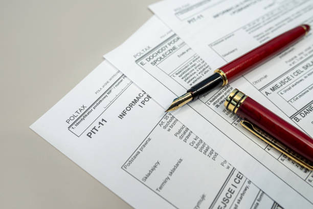 istock polish tax forms pit 11 with pen on office table. Accounting concept. 2195113912