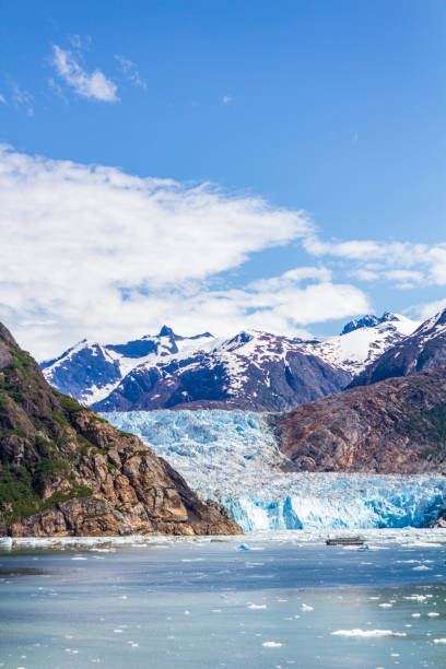 istock Majestic Mountain Range with Stunning Glacier and Calm Waters 2195121285