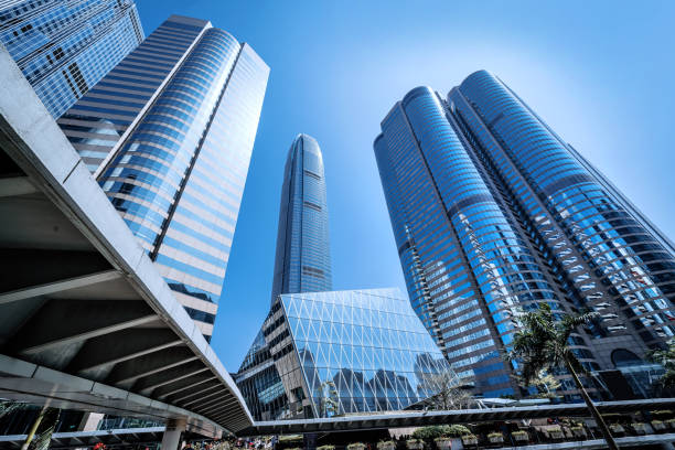 istock Modern Skyscrapers in Central Business District Under Clear Blue Sky 2195121561
