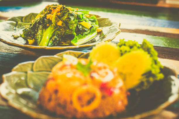 Kailan stirfried  With Oyster Sauce and served in a green dish