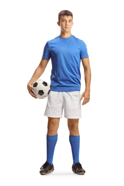istock Young football player with a ball 2195122651