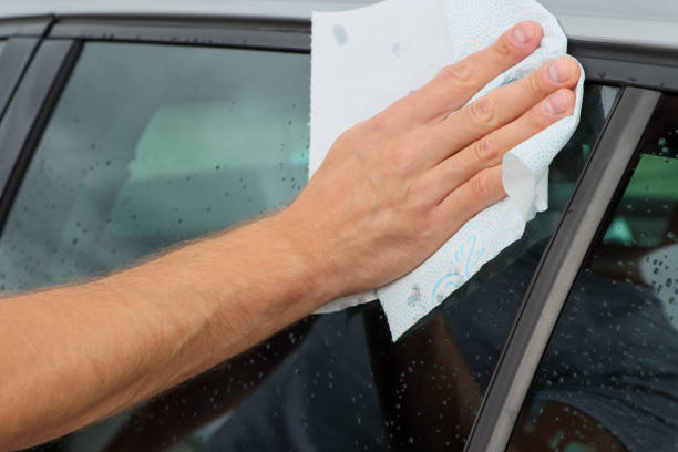 istock man wiping car windows dry 2195122832