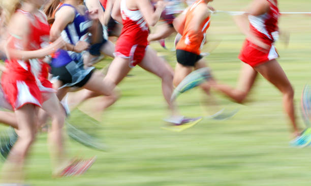 istock Running a Race in Motion. Runners running a race with fast motion 2195124401