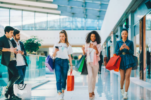 istock Friends in the shopping mall 2195125800