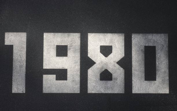 Black granite slab with white numbers 1980 on it