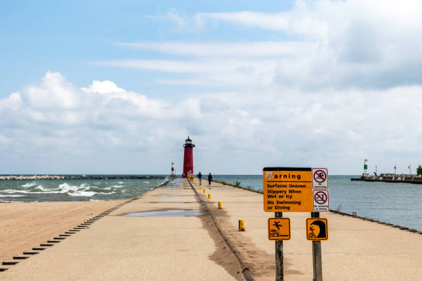 Walkway to the Kenosha, Wisconsin lighthouse on Lake Michigan on a summer day