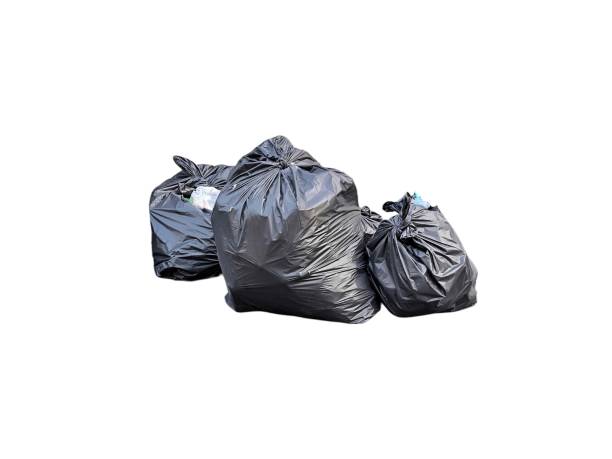 istock Black plastic garbage bag isolated on white background. Waste management. Housekeeping concept 2195128328
