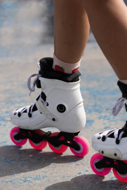 istock Woman in roller blades in skate park 2195130468