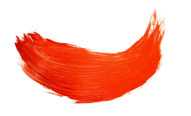 istock Vivid red paint forming a dynamic, curved brushstroke against a clean white backdrop, ideal for adding a bold artistic touch 2195130576