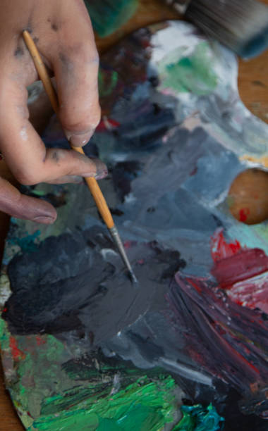 istock art therapy drawing with brushes and paints 2195131638