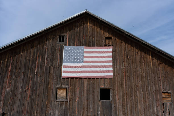 istock American Flag on a farm in Montana 2195131800