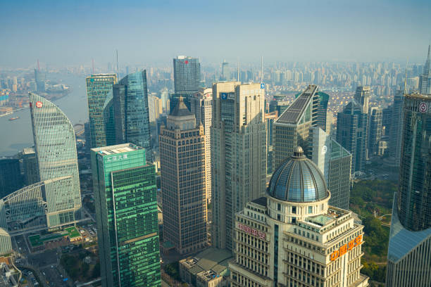 Shanghai, China. January 7, 2025. Panoramic aerial view from Oriental Pearl Tower of Huangpu River in city center