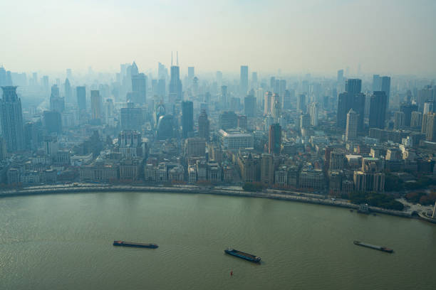 Shanghai, China. January 7, 2025. Panoramic aerial view from Oriental Pearl Tower of Huangpu River in city center