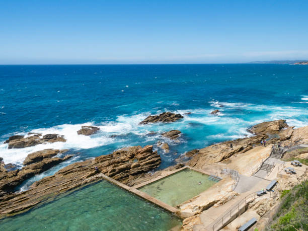 Ocean swimming pool surrounded by rocky coastline