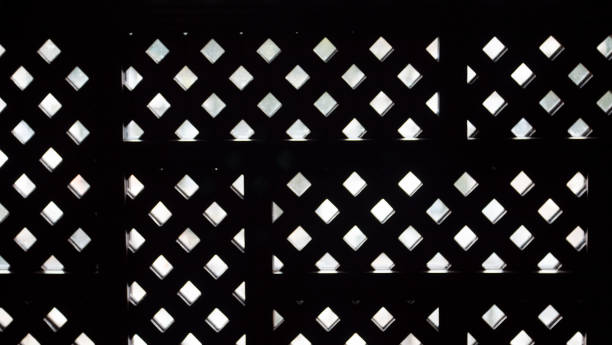 istock Texture of old wooden lattice in backlighting 2195142533