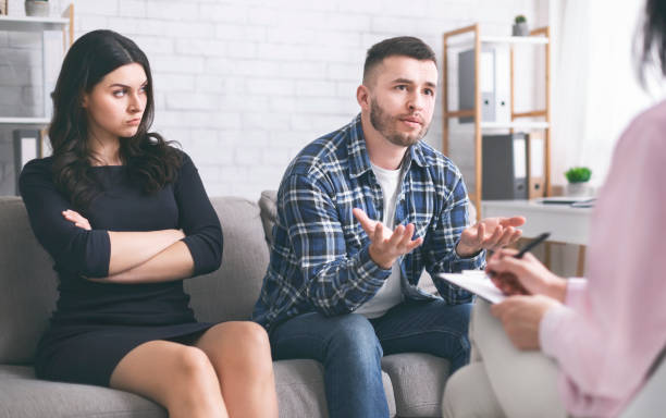 istock Couple Seeking Guidance During Counseling Session in Modern Office Environment 2195157503