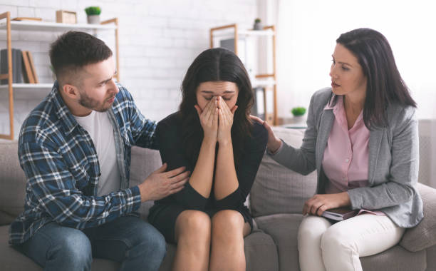 istock Support and Empathy Offered During a Challenging Moment in a Modern Counseling Space 2195157533