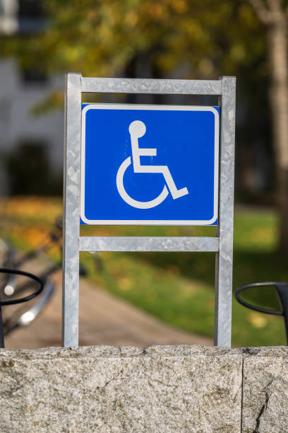istock Handicap parking sign at a parking lot.. 2195158892