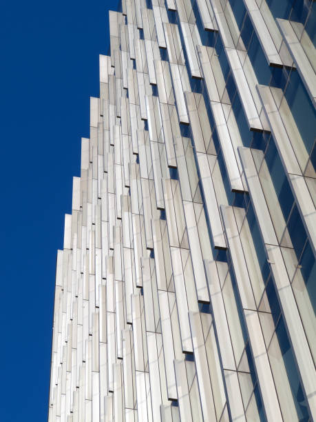 istock Abstract View of Modern Building Facade Against a Clear Blue Sky 2195176239