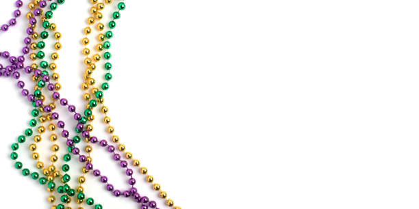 istock Mardi gras beads on white background 2195188273