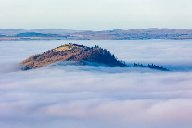 istock Fog filled valleys and mountain peaks at dusk (Brecon Beacons, Wales) 2195190690