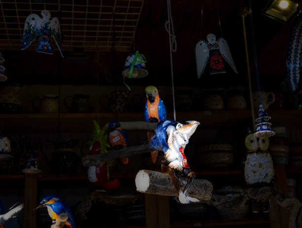 Handmade clay toys, Handmade toys made with clay of colourful owls for Kids in display at Surajkund Craft Fair. Selective focus.